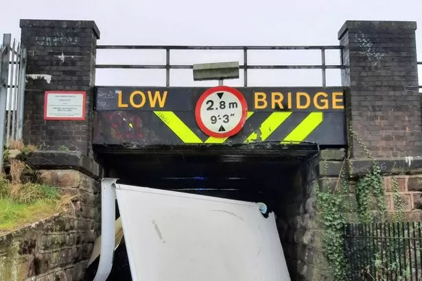 Photos show aftermath of lorry crashing into notorious low bridge