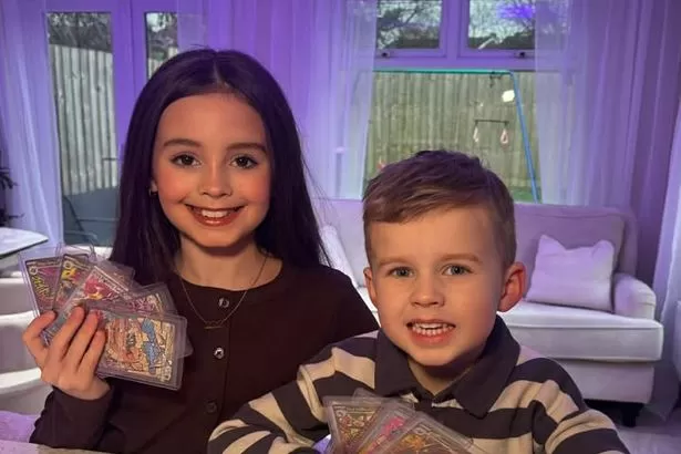 Boy's priceless reaction after opening incredibly rare pack of cards