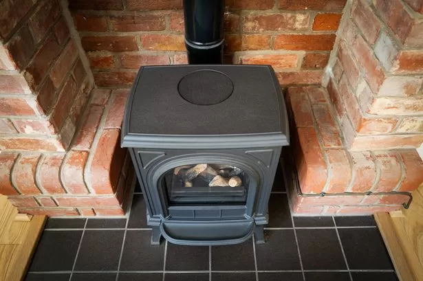 Owners of wood-burning stoves in parts of England to face strict new rules