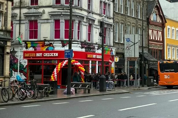 Huge queue stretches through Cardiff arcade as new business opens