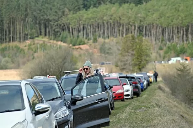 Pen y Fan swarmed with people on Easter Sunday as cars fill verges