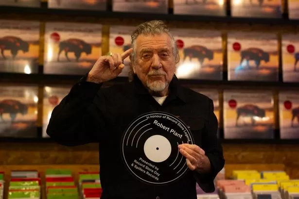 Rock legend makes surprise trip to Cardiff record shop then says he's going for a 'pint of Brains'