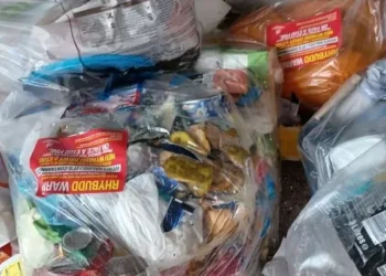 Fed-up residents living in flats surrounded by festering piles of rotting food