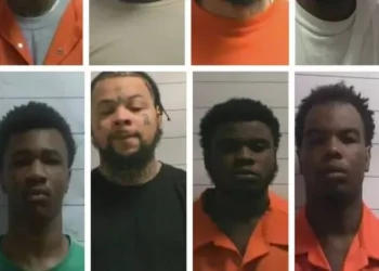 Eleven prisoners escape through hole in the wall and leave taunts to guards