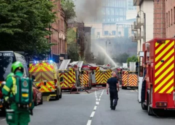 Huge Manchester city centre fire sees ‘ash rain from the sky’