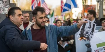 ‘I don’t know if my friends are dead or alive’: Protesters march through Cardiff