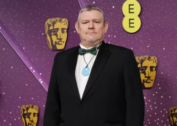 ‘I Swear’ subject John Davidson “deeply mortified” by Tourette’s N-word outburst at BAFTAs