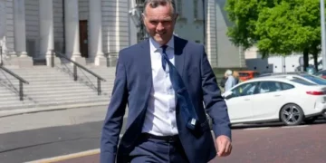 Trainer accused of attacking pensioner gets emotional about horses in court