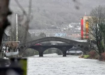 Man rescued from river and taken to hospital