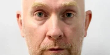 Killer cop Couzens ‘cowers in cell’ as Ian Huntley fights for life after prison attack