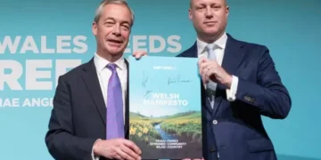 People spot major blunder as Nigel Farage poses at Welsh Reform event