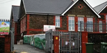 Shy schoolboy dragged into classroom by his arm by teaching assistant, hearing told