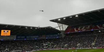 Air ambulance lands outside Cardiff City Stadium during match