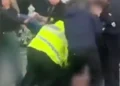 Police draw Tasers as they’re filmed tackling huge fight outside pub after football match