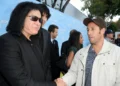 Gene Simmons stuck tongue down Adam Sandler’s throat at party to turn him “into my bitch”