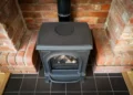 Owners of wood-burning stoves in parts of England to face strict new rules