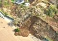 Police at scene of huge beach landslide and public told to ‘stay well away’