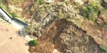 Police at scene of huge beach landslide and public told to ‘stay well away’