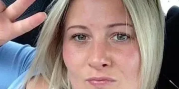 Man accused of murder after woman shot at point-blank range – live updates