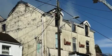 Emergency services at scene as rips through abandoned building – live updates