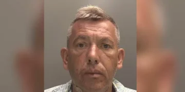 Man stabbed himself in the neck outside police station after vile messages uncovered